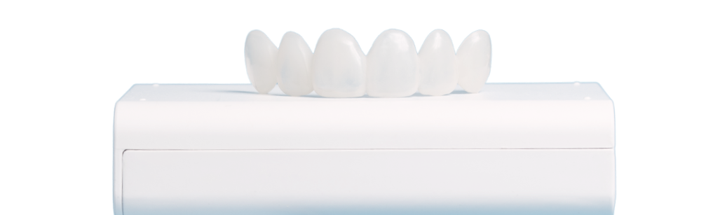 A dental appliance on a white background